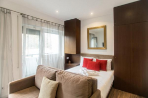 Almada Studios & Suites